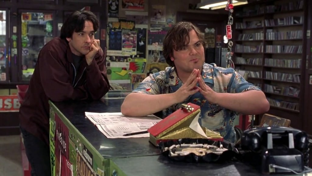 Jack Black, en primer término, junto a John Cusack, en 'Alta fidelidad', de Stephen Frears.